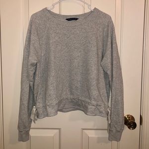 Abercrombie sweater with bow ties at the bottom